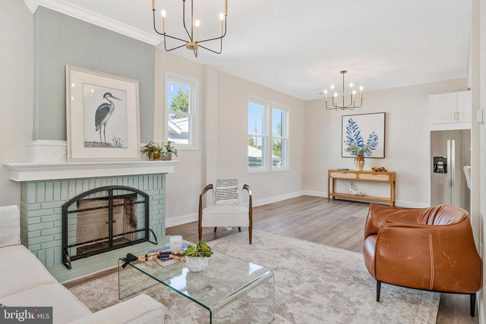 2140 32nd Street Southeast Washington, DC 20020 - Photo 9 of 50 a living room with furniture and a fireplace