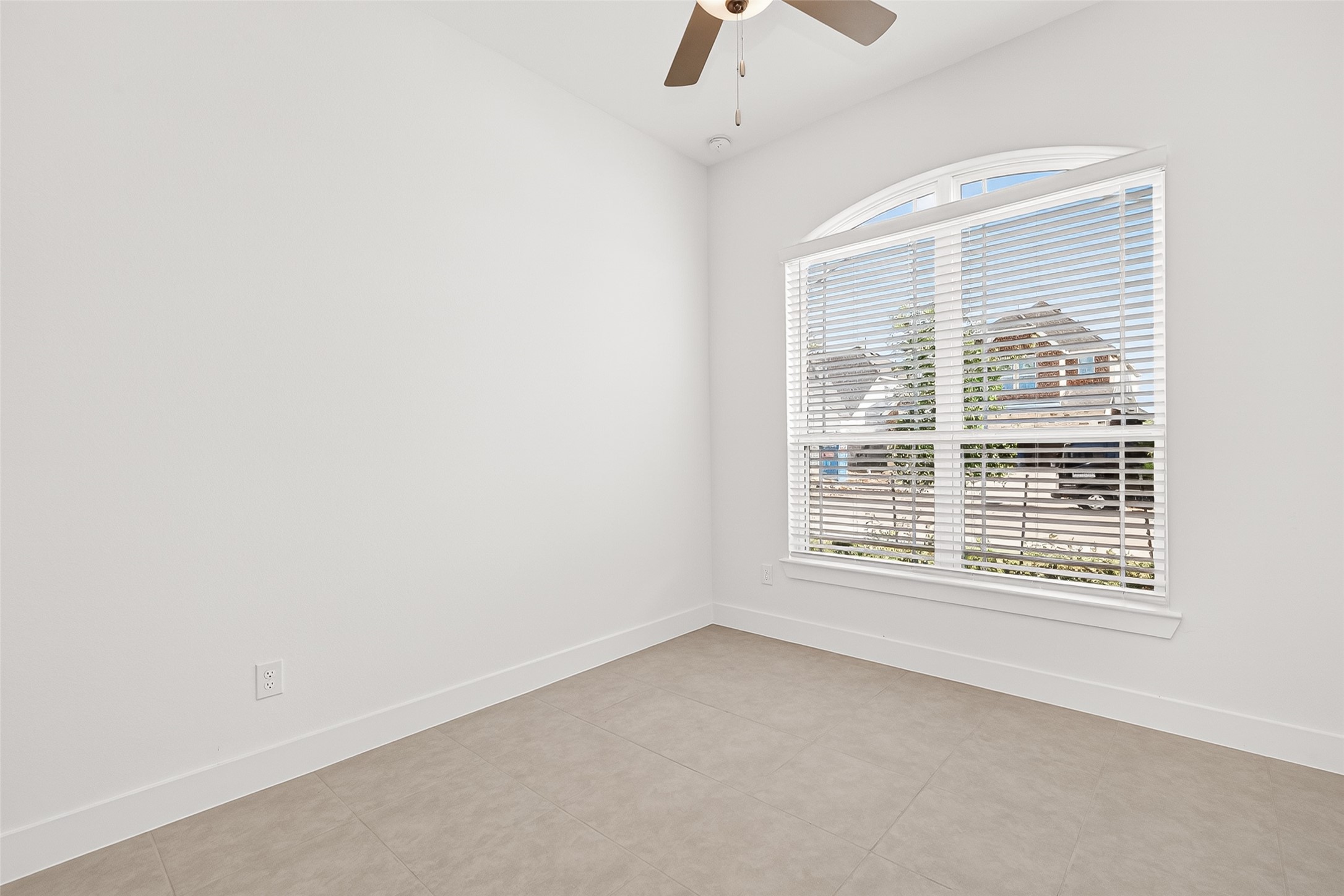 4916 Northern Wds Drive Spring, TX 77386 - Photo 20 of 44 a view of an empty room with a window