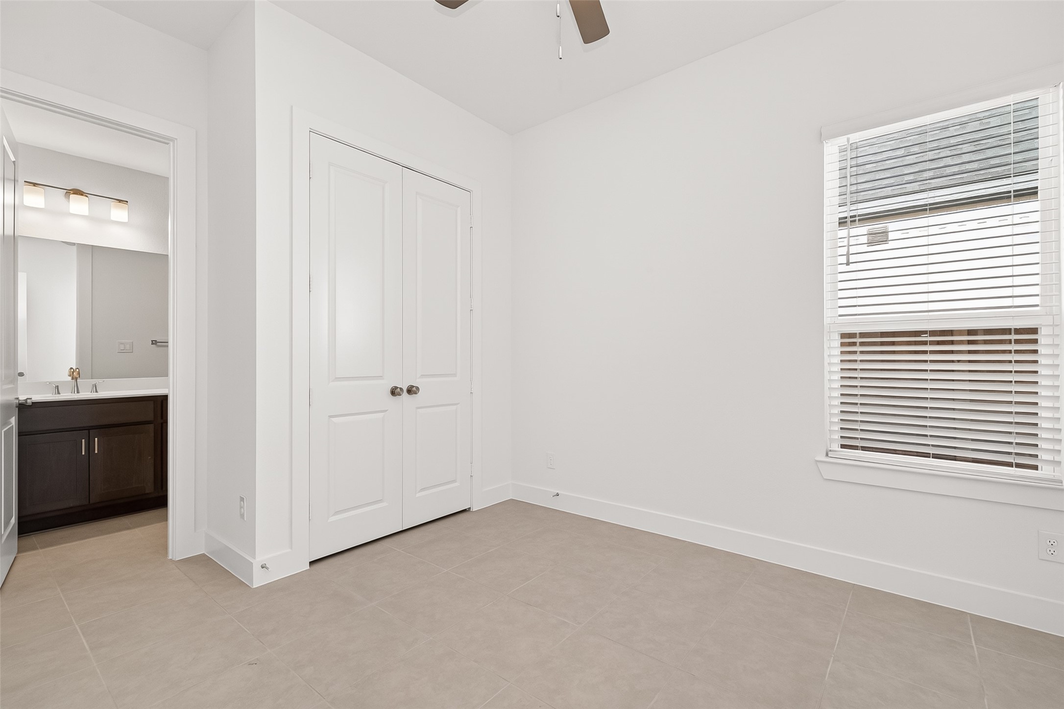 4916 Northern Wds Drive Spring, TX 77386 - Photo 26 of 44 an empty room with windows
