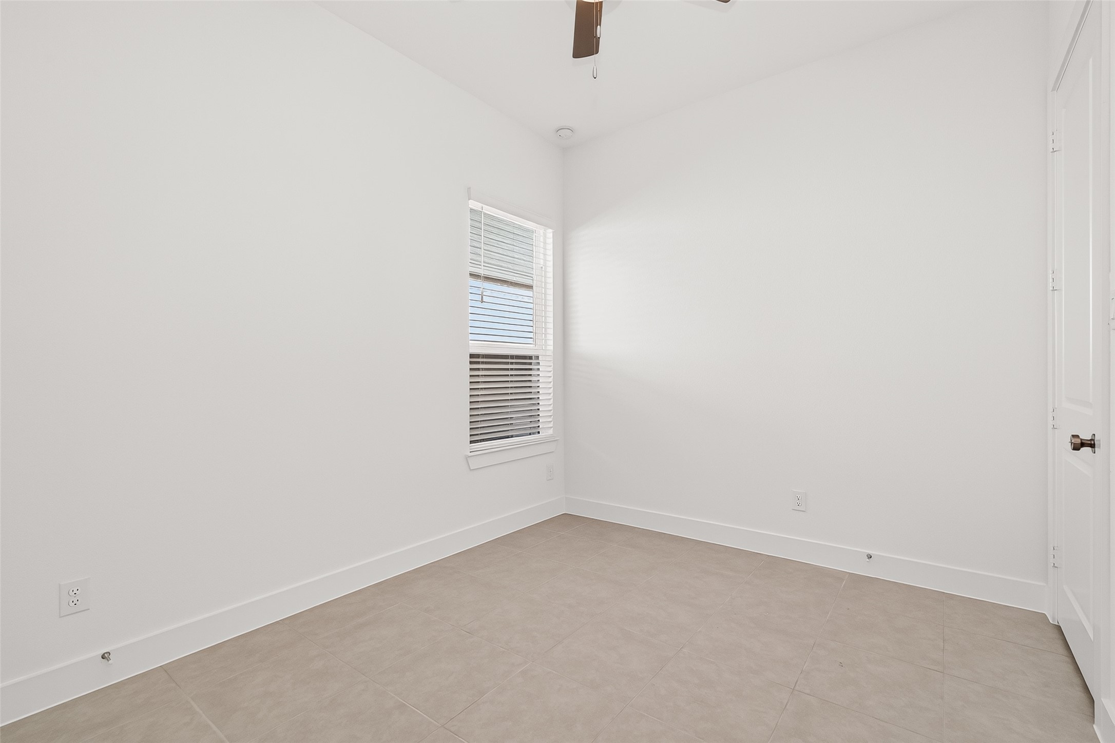 4916 Northern Wds Drive Spring, TX 77386 - Photo 29 of 44 an empty room with a window