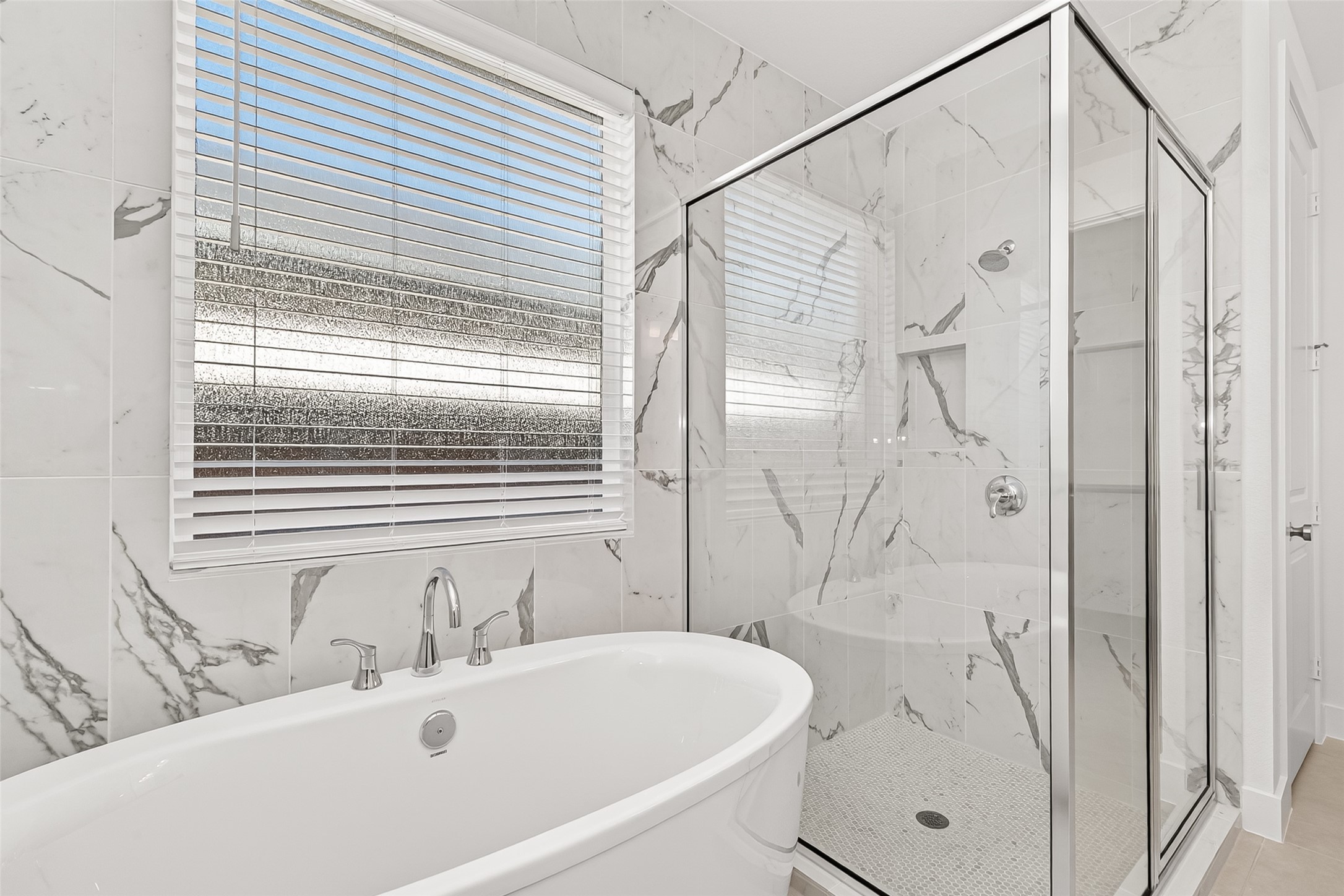 4916 Northern Wds Drive Spring, TX 77386 - Photo 39 of 44 a bathroom with a bathtub and a shower