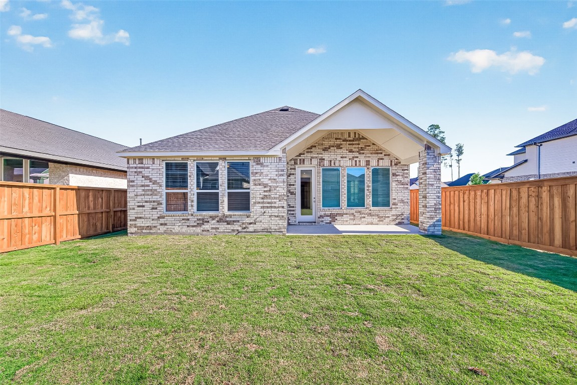 4916 Northern Wds Drive Spring, TX 77386 - Photo 41 of 44 a view of house with backyard and balcony