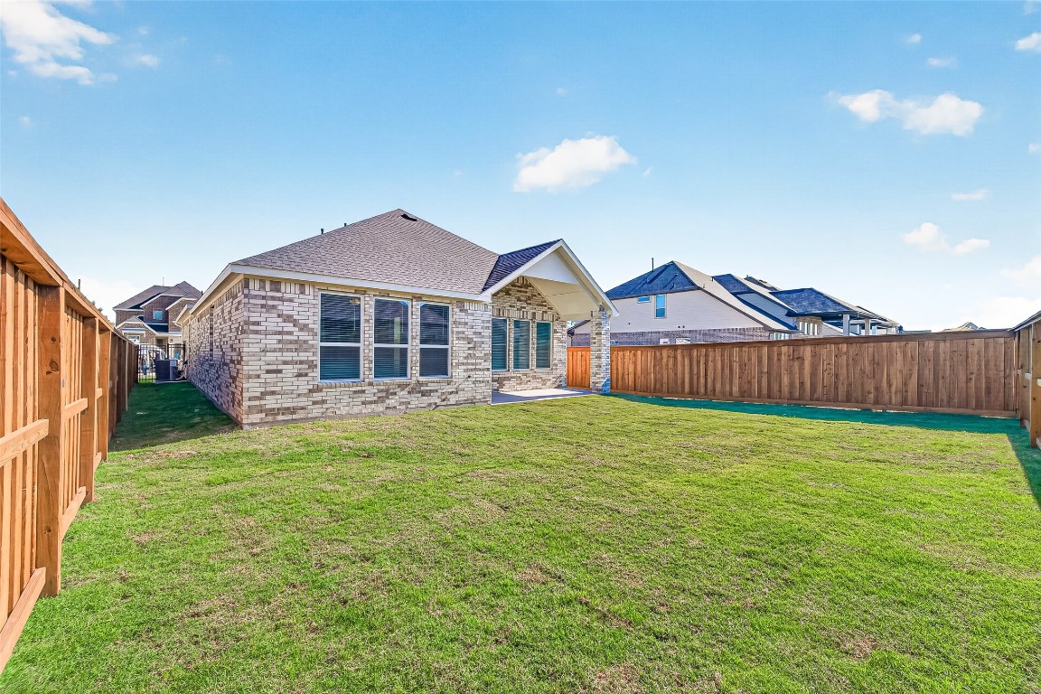 4916 Northern Wds Drive Spring, TX 77386 - Photo 42 of 44 a view of a house with a yard and deck