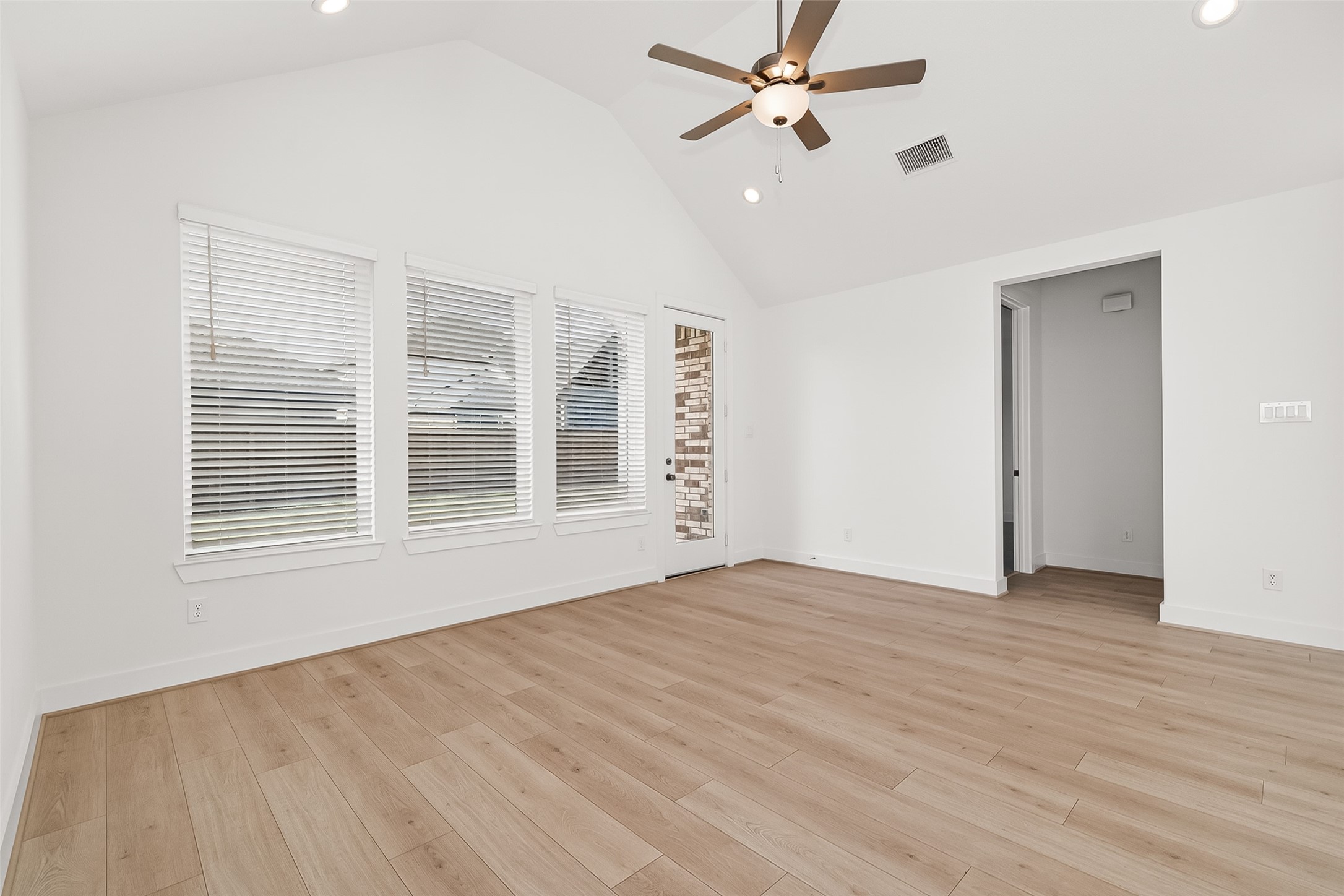 4916 Northern Wds Drive Spring, TX 77386 - Photo 9 of 44 a view of empty room with wooden floor and fan
