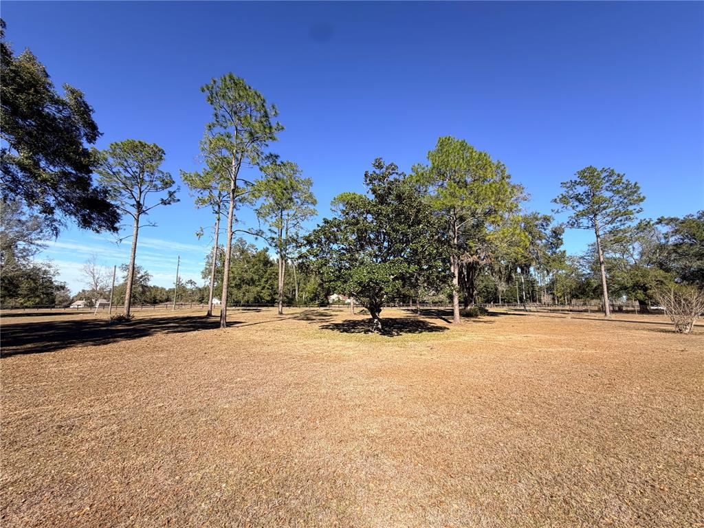 35324 Blanton Road Dade City, FL 33523 - Photo 13 of 49 a view of a lake with a houses