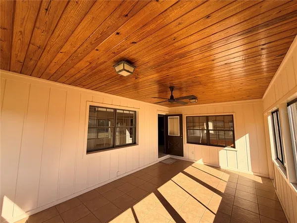 a kitchen with stainless steel appliances granite countertop a sink a stove top oven a counter space and cabinets