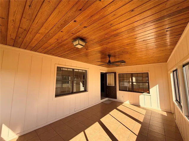 a kitchen with stainless steel appliances granite countertop a sink a stove top oven a counter space and cabinets