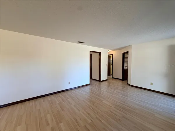 a bathroom with a shower and a window