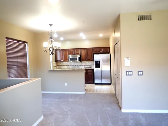 a view of kitchen and a window