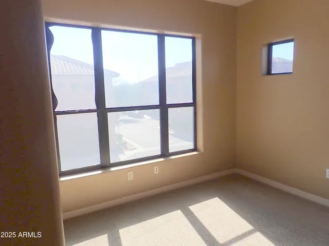 a bathroom with a granite countertop toilet sink and shower