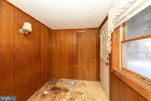 a view of a bathroom with shower and a window