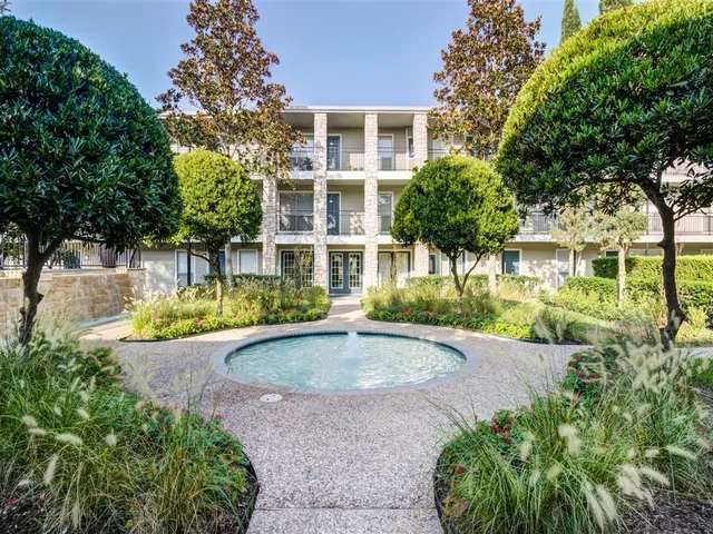 front view of a house with a garden