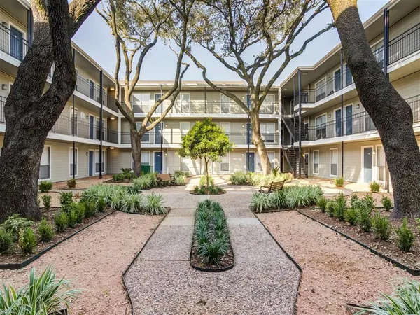a front view of a multi story residential apartment buildings