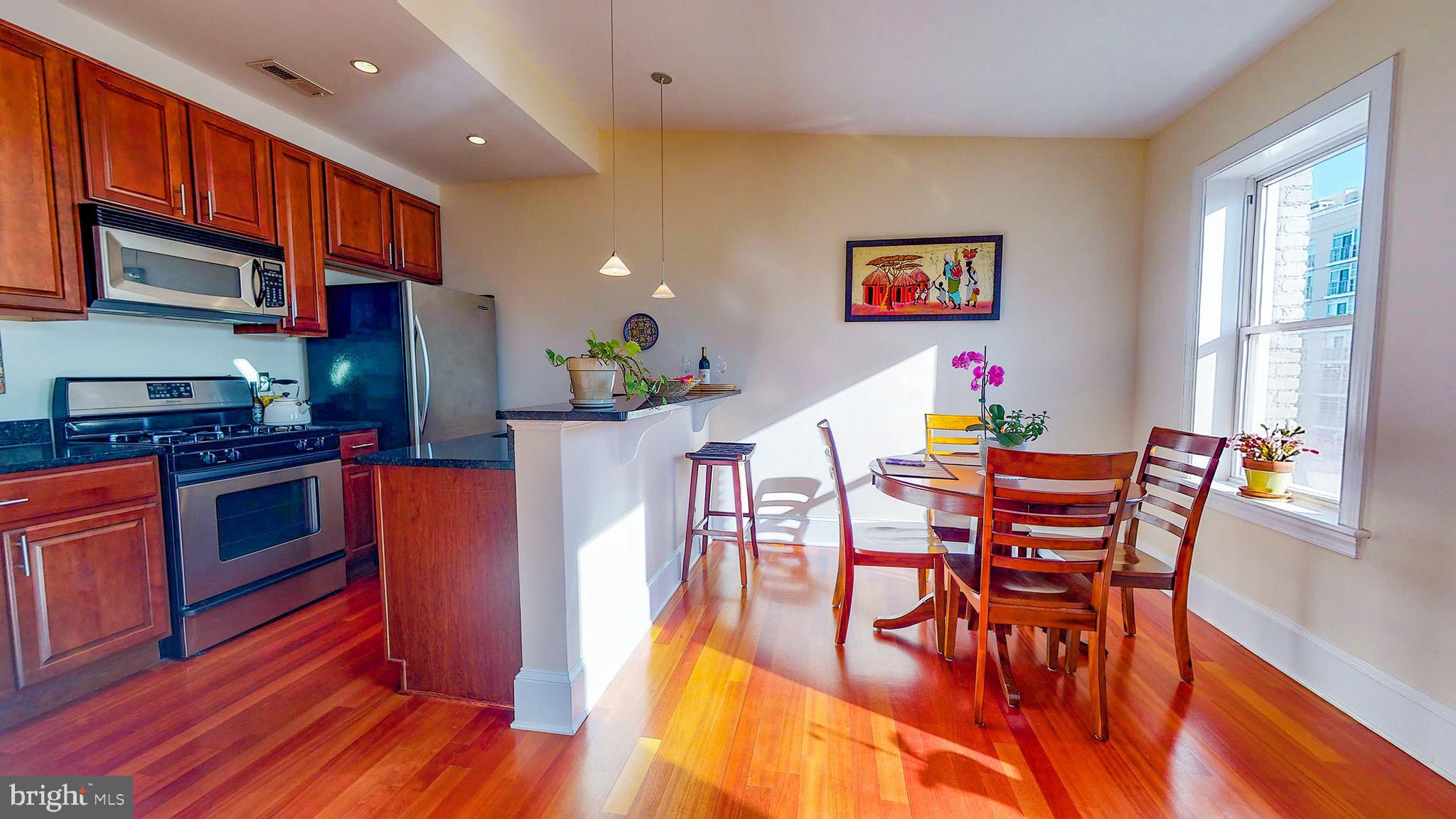 1465 Columbia Road Northwest, Unit 402 Washington, DC 20009 - Photo 12 of 39 Kitchen and dining area