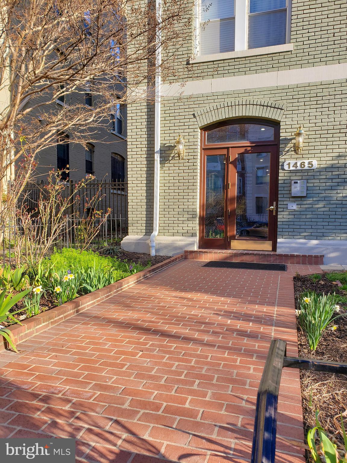 1465 Columbia Road Northwest, Unit 402 Washington, DC 20009 - Photo 3 of 39 Building's brick walkway and entry