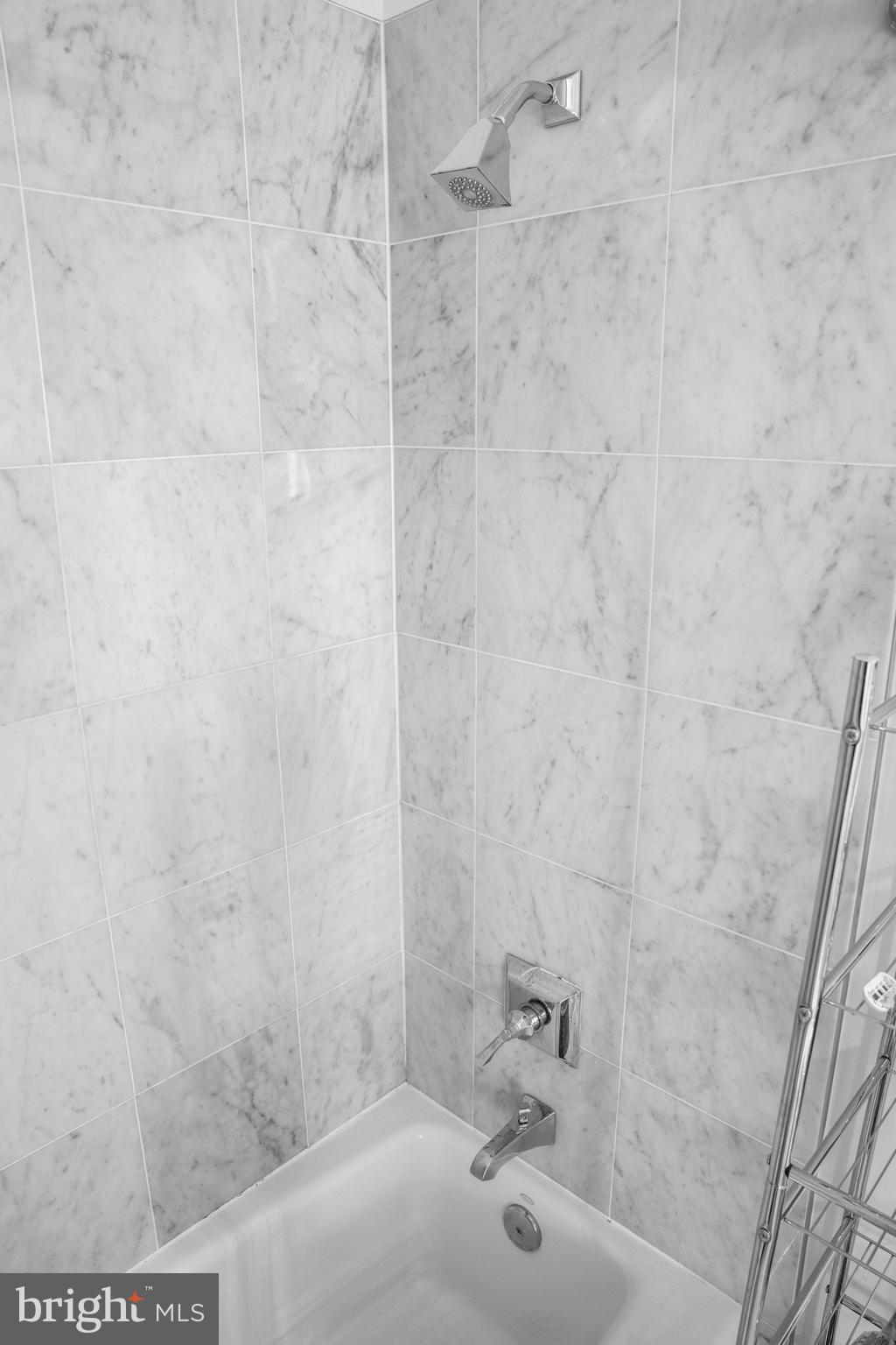 1465 Columbia Road Northwest, Unit 402 Washington, DC 20009 - Photo 27 of 39 Marble tile bath