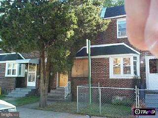 1342 Decatur Street Camden, NJ 08104 - Photo 1 of 1 a front view of a house with parking