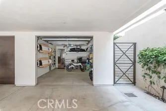 a view of a livingroom with walk in closet and storage