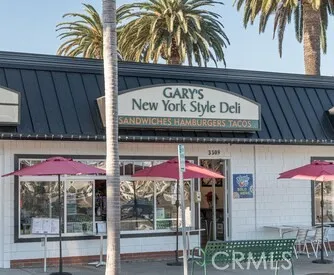 a view of a shop in a street