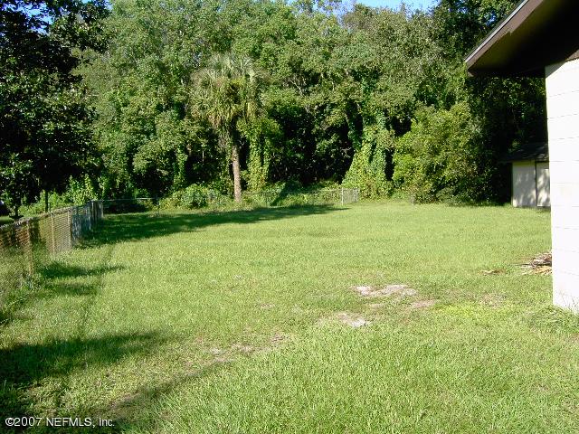 1201 Hibiscus Street St. Augustine, FL 32084 - Photo 11 of 16 a view of a field with a tree