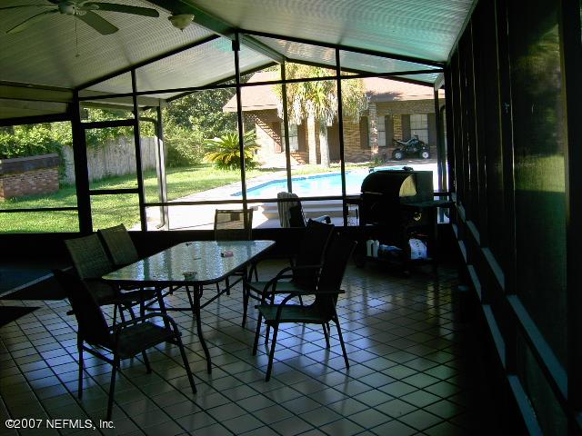 1201 Hibiscus Street St. Augustine, FL 32084 - Photo 15 of 16 a view of a dining room with furniture window and outside view