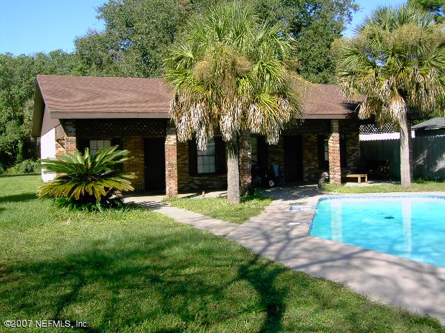 1201 Hibiscus Street St. Augustine, FL 32084 - Photo 16 of 16 a view of a house with a yard