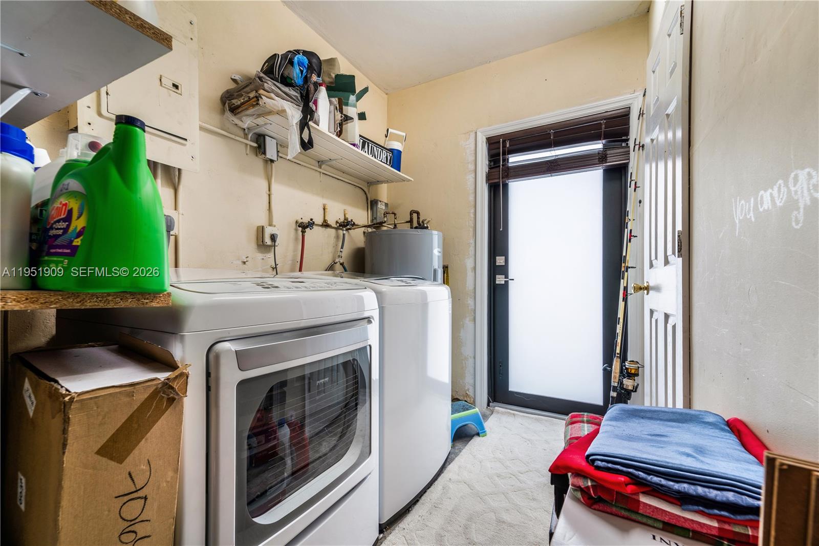 8065 West 14th Court Hialeah, FL 33014 - Photo 27 of 44 Laundry in Storage Room w/Door to Backyard