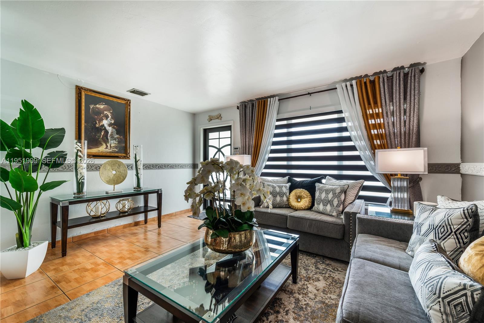 8065 West 14th Court Hialeah, FL 33014 - Photo 29 of 44 Livingroom w/Impact Windows & Door