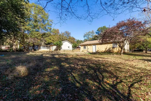 a view of a yard with a barn