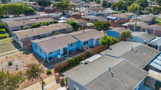 an aerial view of a house with a garden