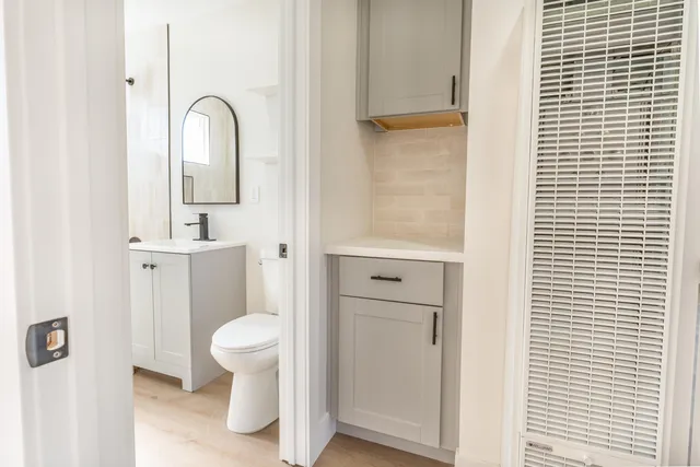 a bathroom with a toilet and a sink