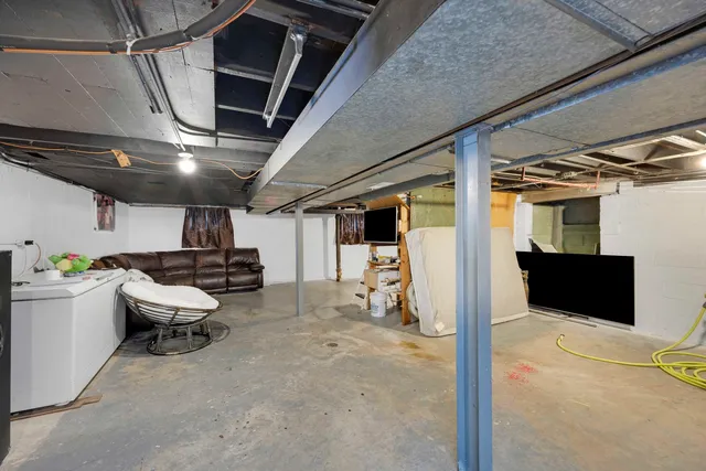 a view of a storage room with a kitchen