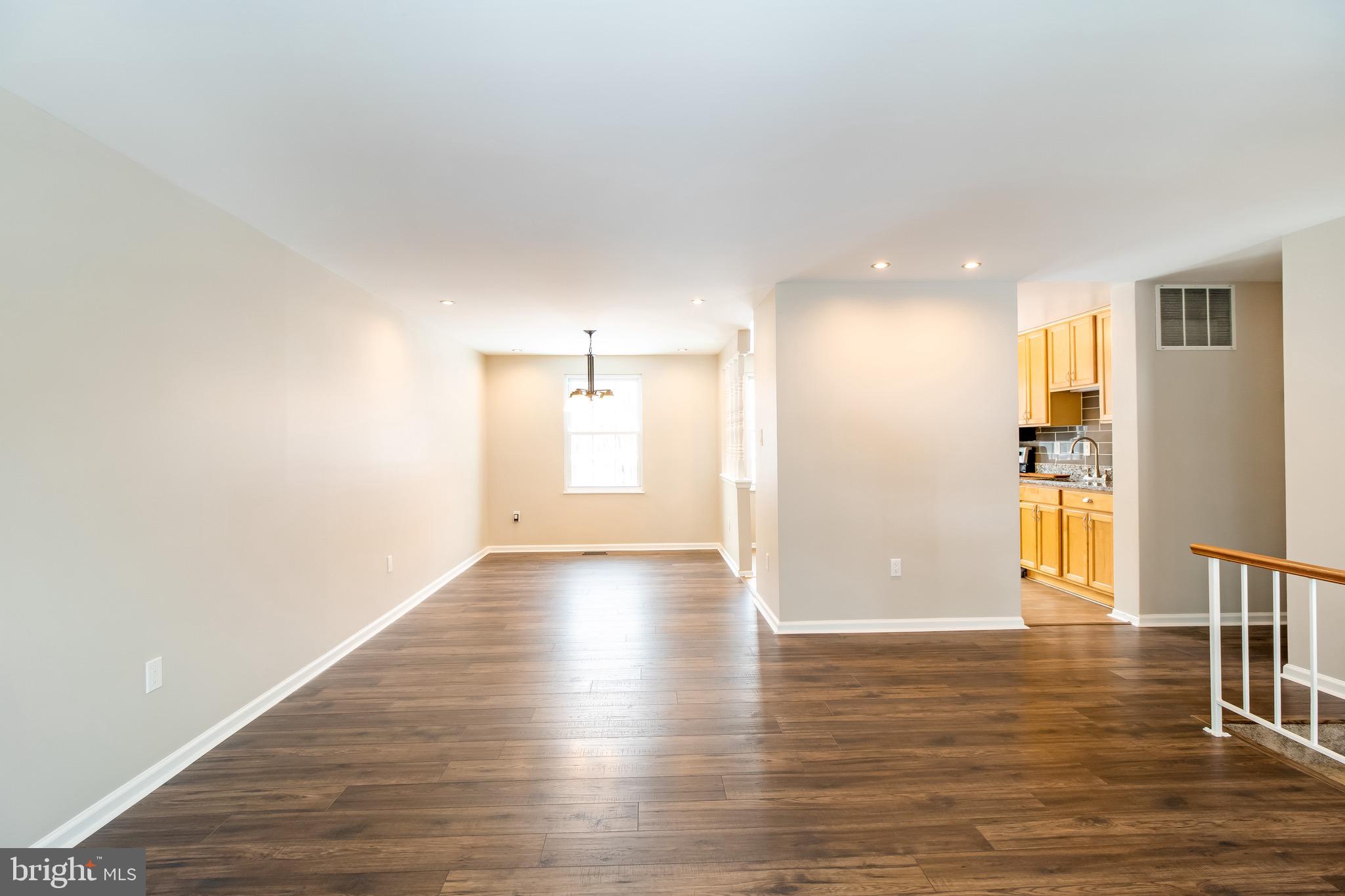 15424 Wembrough Street Silver Spring, MD 20905 - Photo 14 of 40 Open concept upper level-new flooring