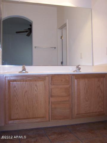 3329 West Hayduk Road Laveen, AZ 85339 - Photo 3 of 5 Master Bathroom Oak Cabinets