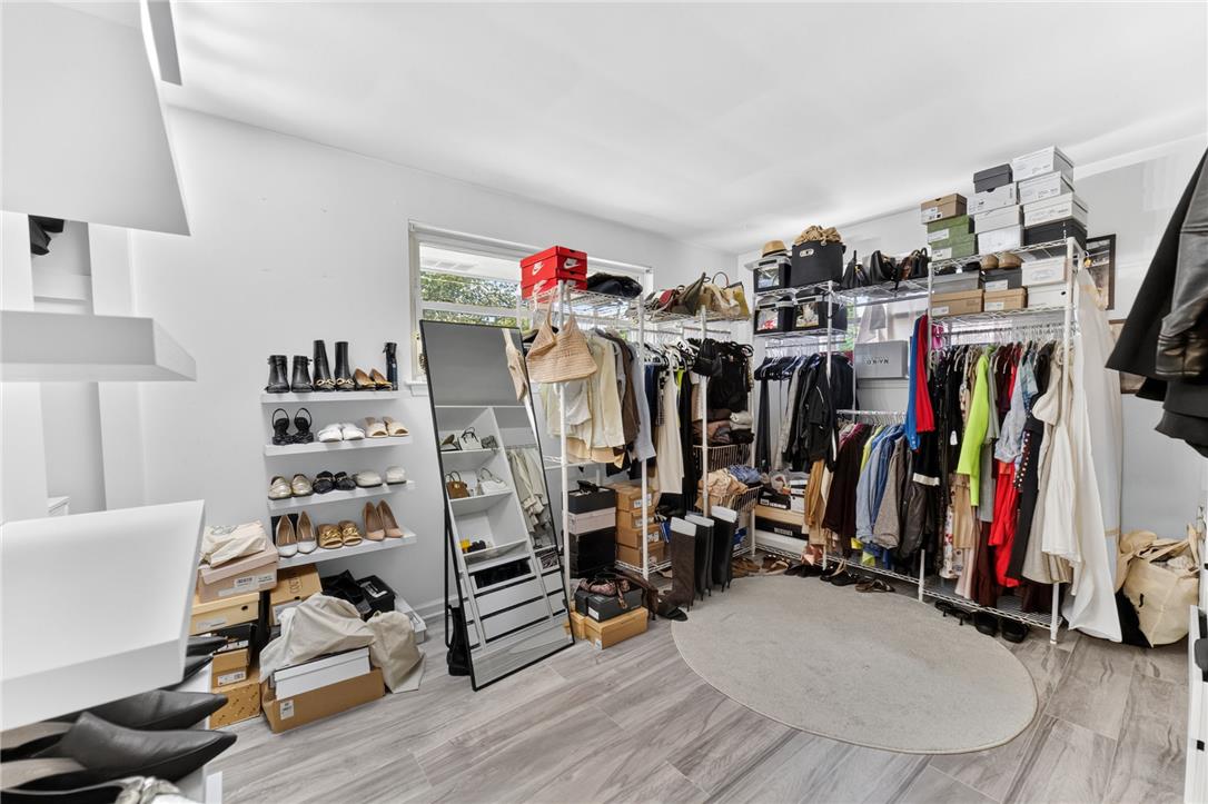 7290 Heather Road Macungie, PA 18062 - Photo 25 of 39 Ample shelving and hanging space in this well-appointed closet create an organized dressing area.