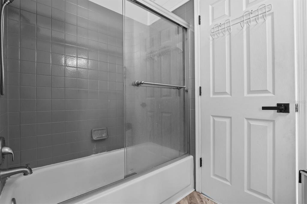 1049 Larkin Road Spring Hill, FL 34608 - Photo 42 of 64 a bathroom with a bathtub