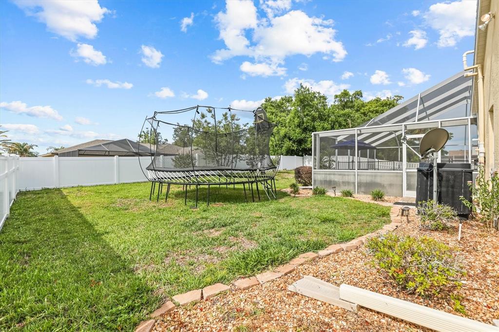 1049 Larkin Road Spring Hill, FL 34608 - Photo 55 of 64 a view of a backyard