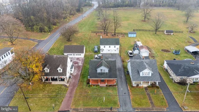 a utility room with lots of wooden furniture