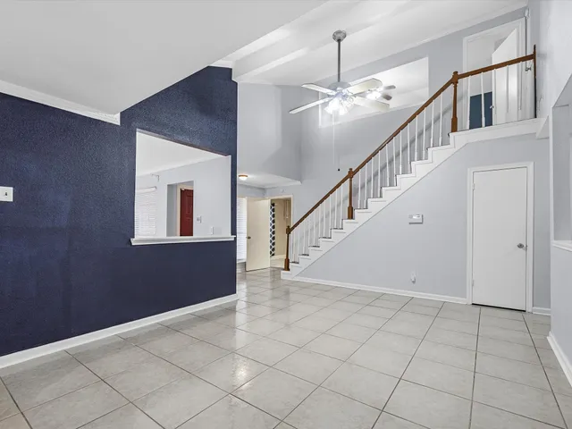 a view of an entryway with staircase