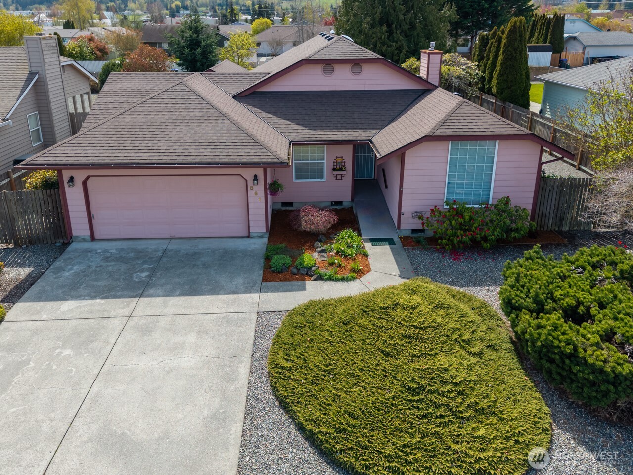 front view of a house with a yard
