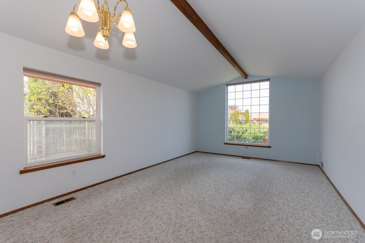 861 East Spruce Street Sequim, WA 98382 - Photo 16 of 39 an empty room with a window