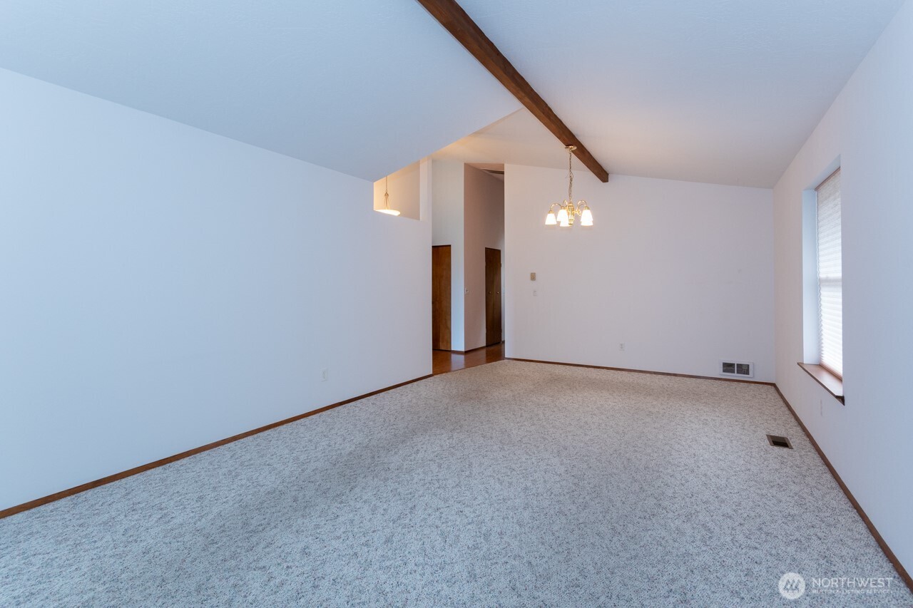 861 East Spruce Street Sequim, WA 98382 - Photo 17 of 39 a view of a big room with closet and windows