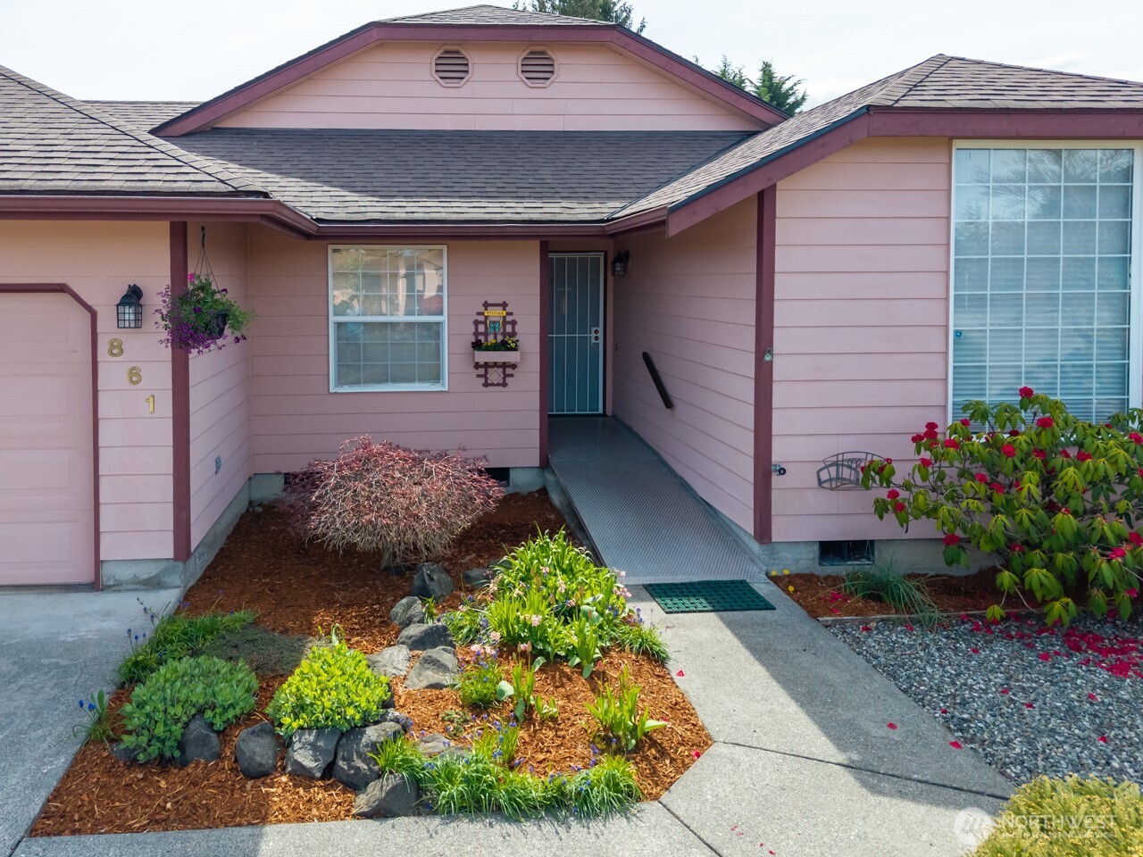 861 East Spruce Street Sequim, WA 98382 - Photo 2 of 39 a front view of house with yard