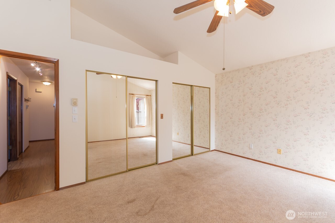 861 East Spruce Street Sequim, WA 98382 - Photo 22 of 39 a view of empty room with ceiling fan
