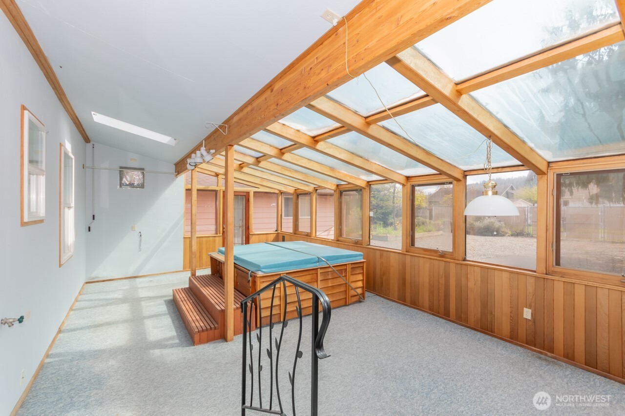 861 East Spruce Street Sequim, WA 98382 - Photo 25 of 39 a view of a porch with furniture and backyard