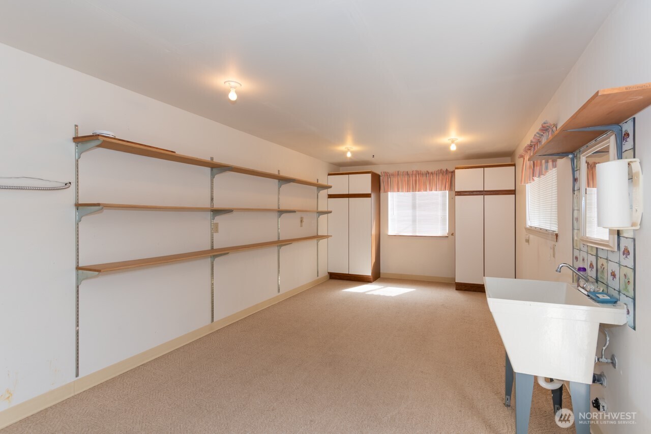861 East Spruce Street Sequim, WA 98382 - Photo 27 of 39 a view of an empty room with a window
