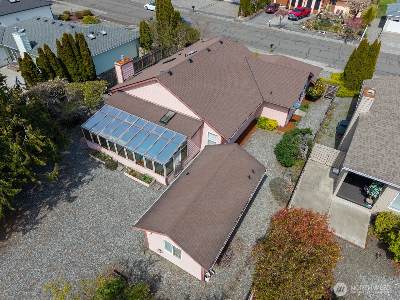 861 East Spruce Street Sequim, WA 98382 - Photo 3 of 39 an aerial view of multiple houses with outdoor space