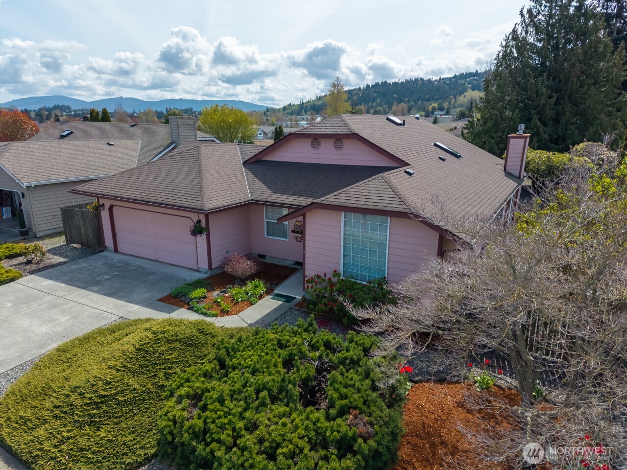 861 East Spruce Street Sequim, WA 98382 - Photo 4 of 39 a aerial view of a house with a yard and large tree