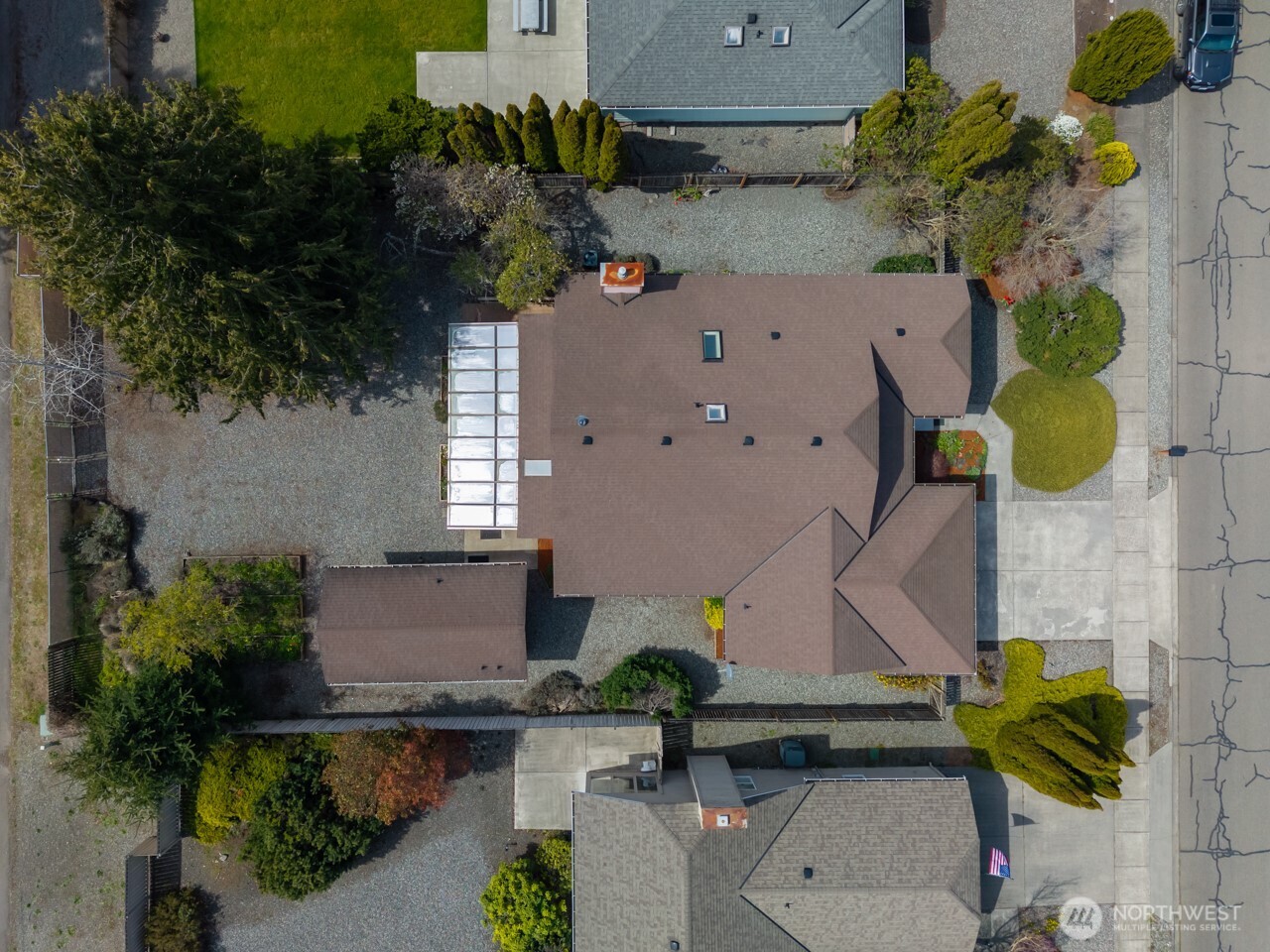 861 East Spruce Street Sequim, WA 98382 - Photo 8 of 39 an aerial view of a house with a yard and garden