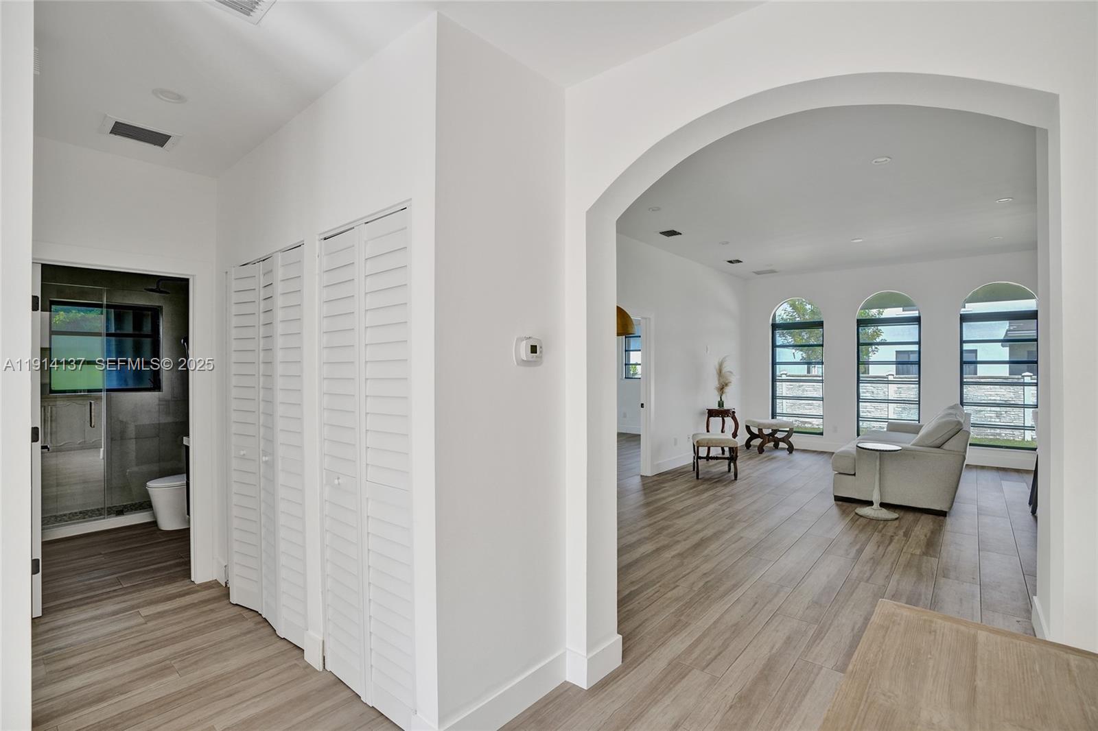 8371 Southwest 122nd Street Miami, FL 33156 - Photo 12 of 39 a view of a livingroom with wooden floor and furniture